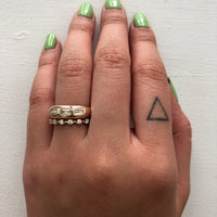 tania-band-round-diamond-three-quarter-band-negative-space