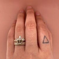 open-baguette-contour-wedding-band,horizontal-baguette-round-diamond-wide-band