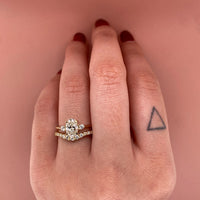 maxine-band-shared-prongs-round-brilliant-diamonds-half-contour-band