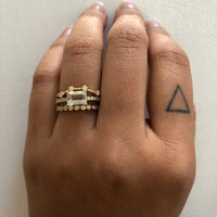 aimee-band-curved-diamond-contour-band-with-negative-space,bezeled-round-half-diamond-band