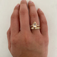 aja-band-bezel-set-baguette-half-band