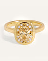 oria-ring-oval-champagne-diamond-with-small-diamonds-and-metal-boarder