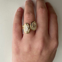 oria-ring-oval-champagne-diamond-with-small-diamonds-and-metal-boarder